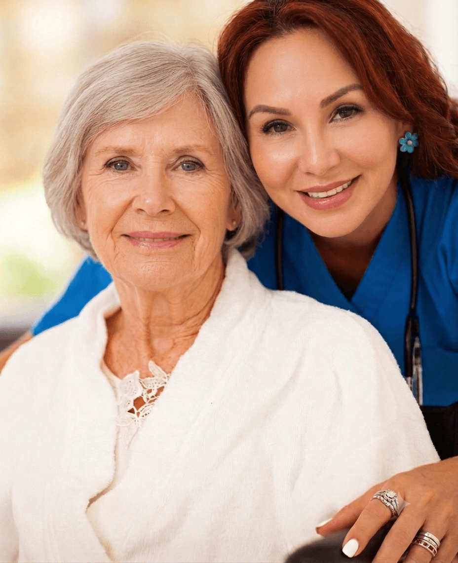 Kriss, RN, sharing a quiet moment with a resident